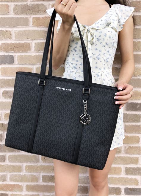 michael kors zip closure handbags.